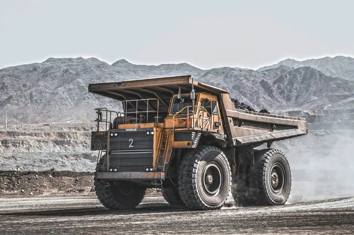 Haul truck driving through an open-pit mine